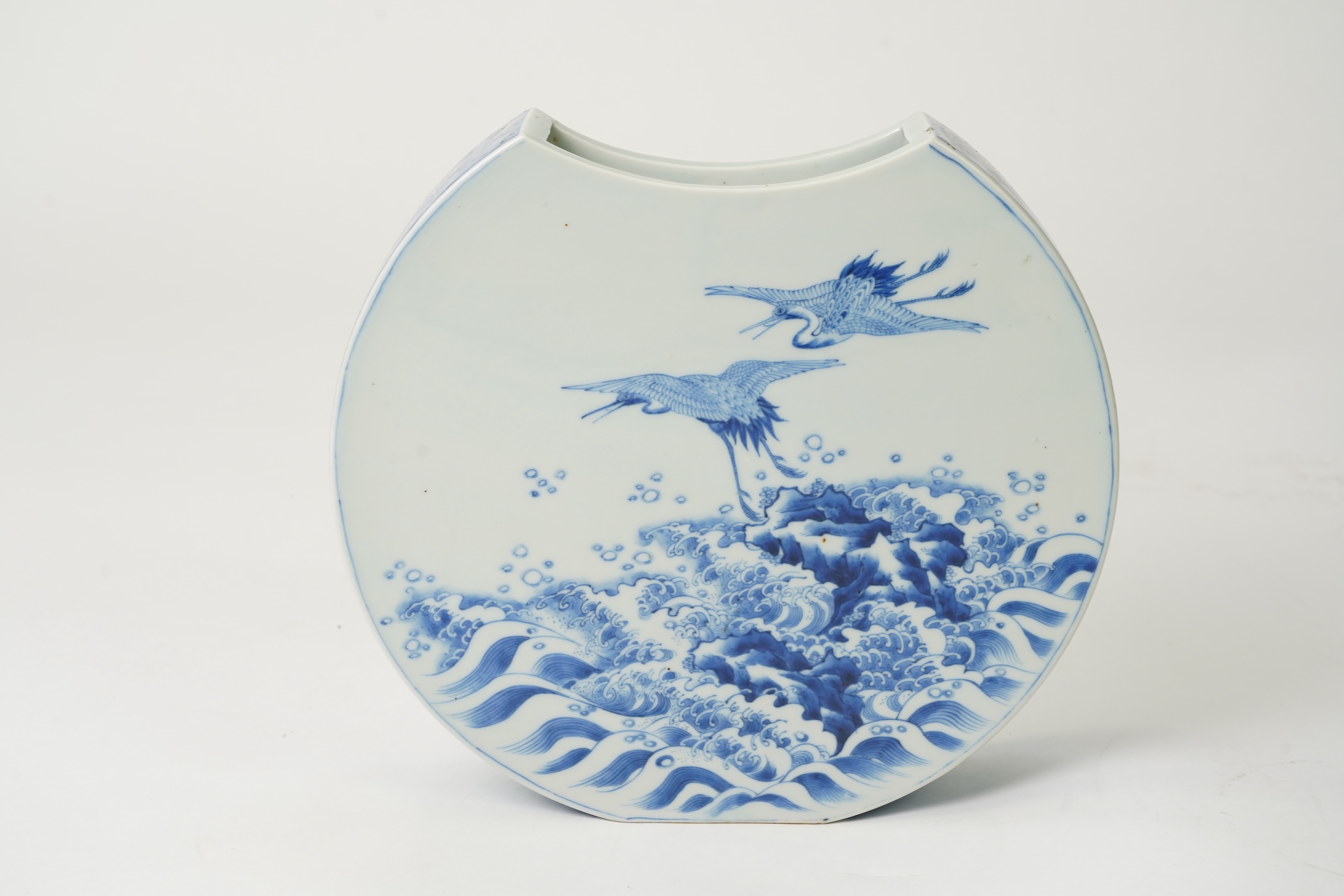 A Japanese blue and white crescent moon-shaped vase, probably Arita, late 19th century